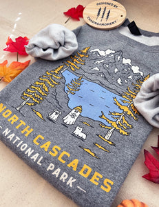 North Cascades Spooky National Park Unisex Sweatshirt | HEATHER GRAPHITE